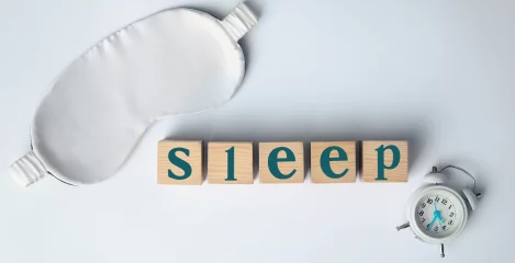 "Sleep" auf den Holzklötzen geschrieben